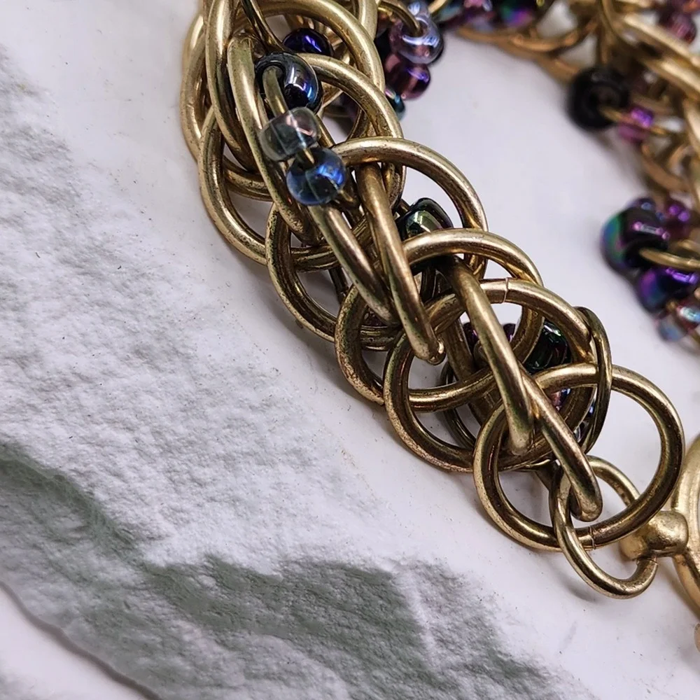 Kenneth Cole Gold Tone Woven Ring Bracelet Purple Bead Chunky Toggle Statement